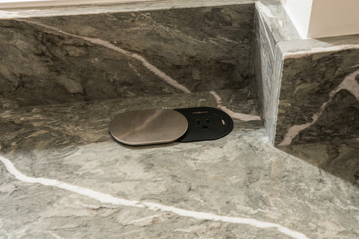 Detail of the green marble mitred edge and veining match